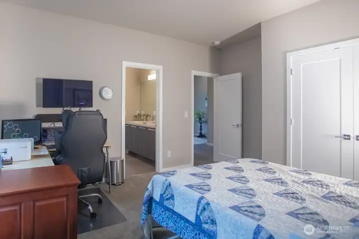Second bedroom looking back at Jack and Jill bathroom beyond