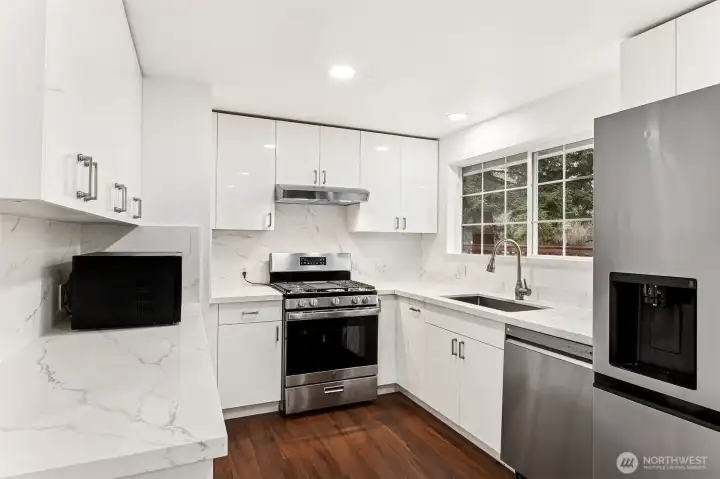 Kitchen with newer appliances and brand new water filtration system.