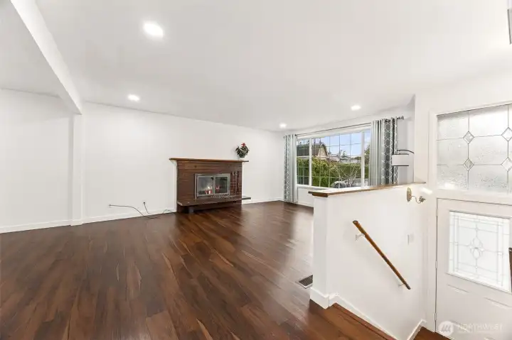 Stairs leading to basement from main living room.