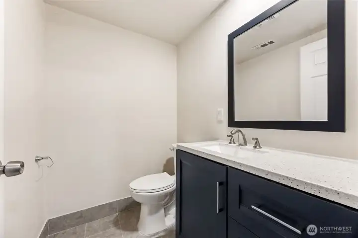 Half basement bathroom.