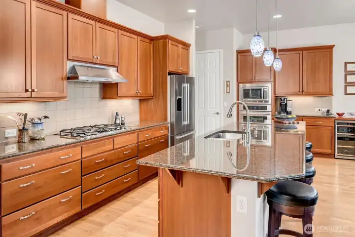 Kitchen with Slab Granite Counters