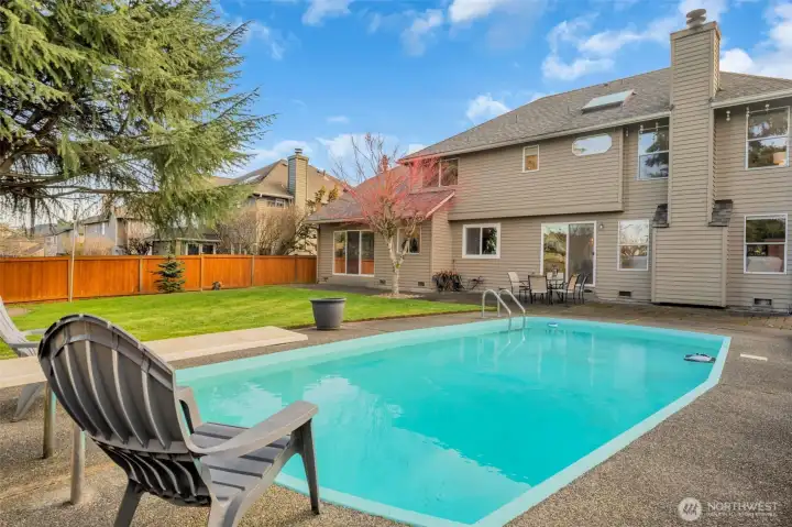 Spacious backyard retreat with pool, firepit, and room to relax or entertain