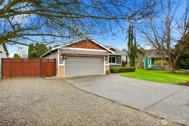 Spacious driveway with abundant additional parking alongside.