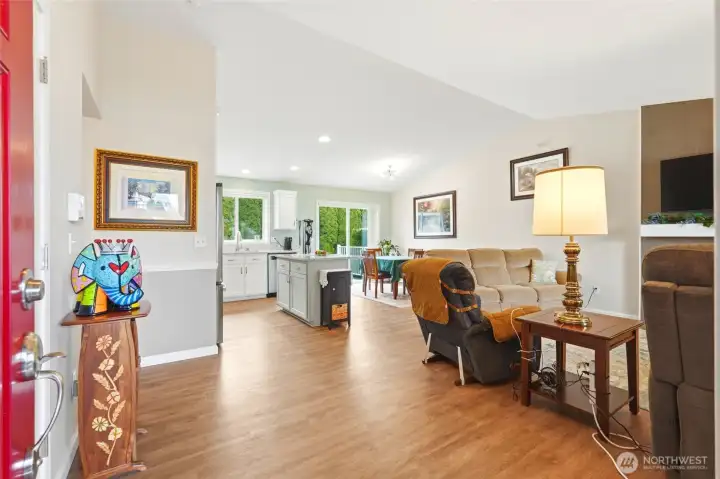 Open sightlines create a natural connection between living, dining, and kitchen.