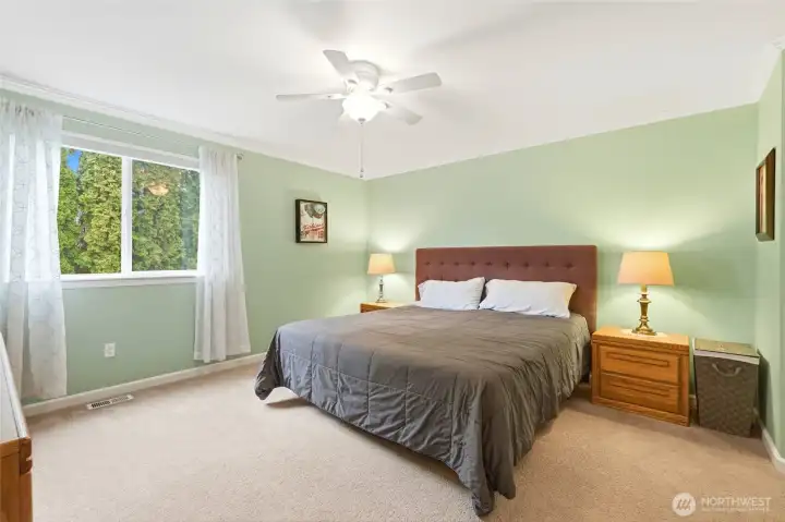 A calm and inviting retreat with soft natural light and plenty of room to unwind.