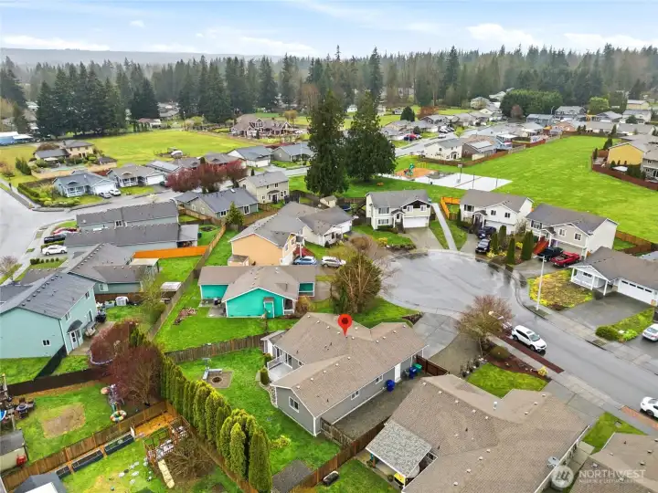 A peaceful residential setting with a balance of privacy and connection.