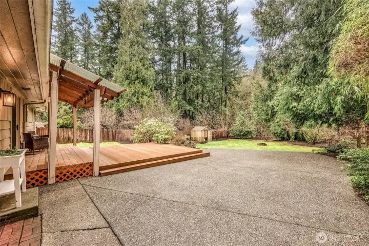 Generous outdoor space with deck access and room to gather.