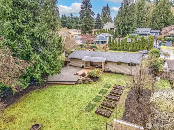 Elevated view highlighting the property layout and outdoor features.