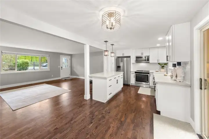 The kitchen opens beautifully into the living room.