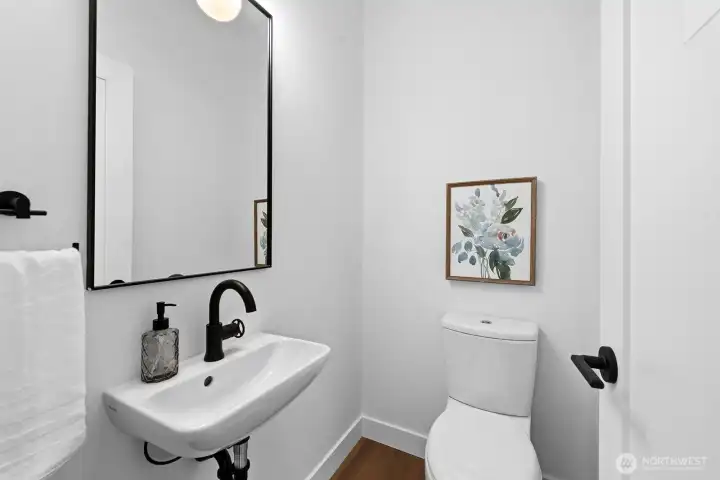 Coveted main floor powder room.