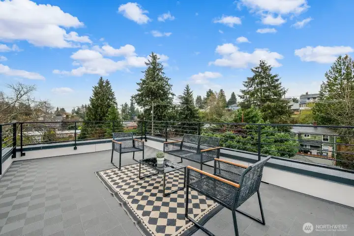 Large rooftop deck with territorial views.