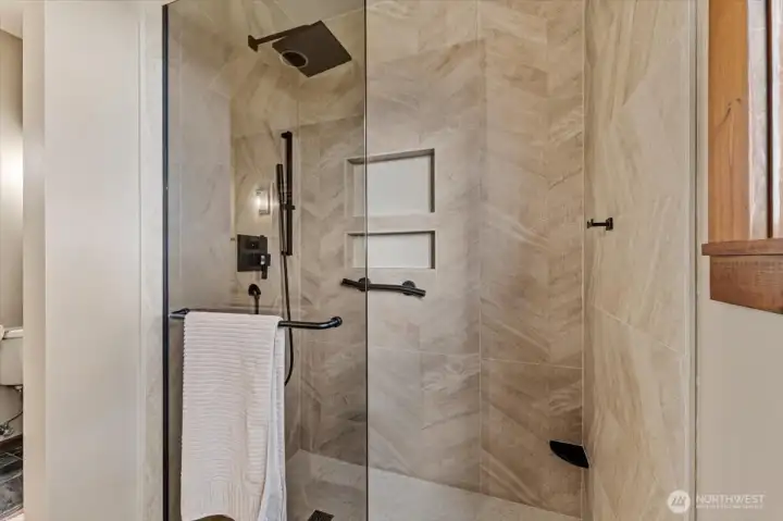 Stand up shower with beautiful tile work