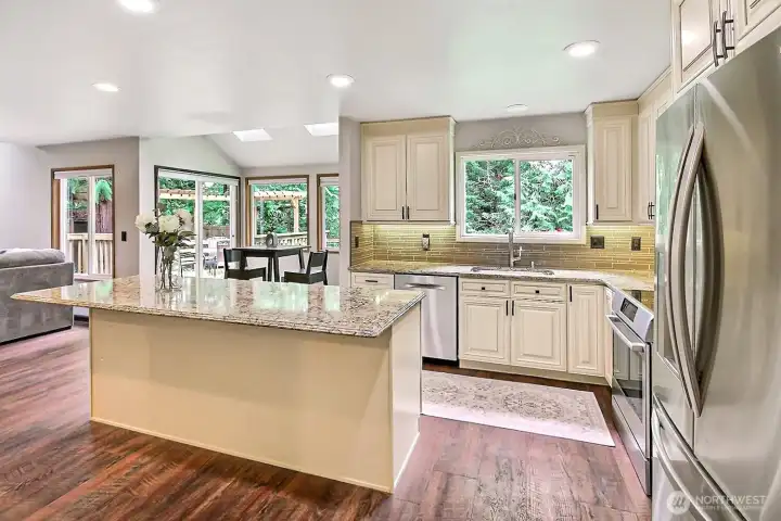 Island kitchen with custom cabinetry