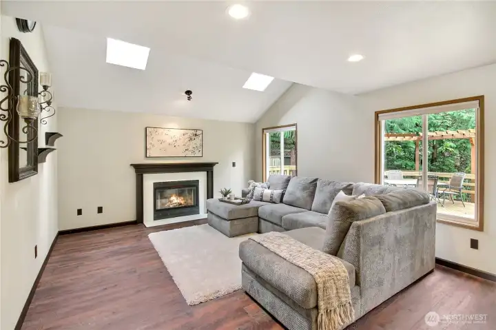 Vaulted ceilings and skylights over huge family room