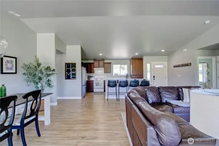 Spacious living and dining room, eating bar in kitchen.