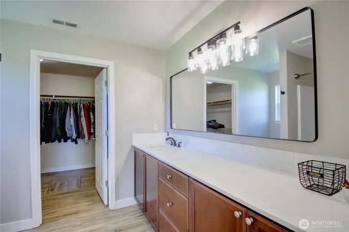 Primary bathroom with walk-in closet.