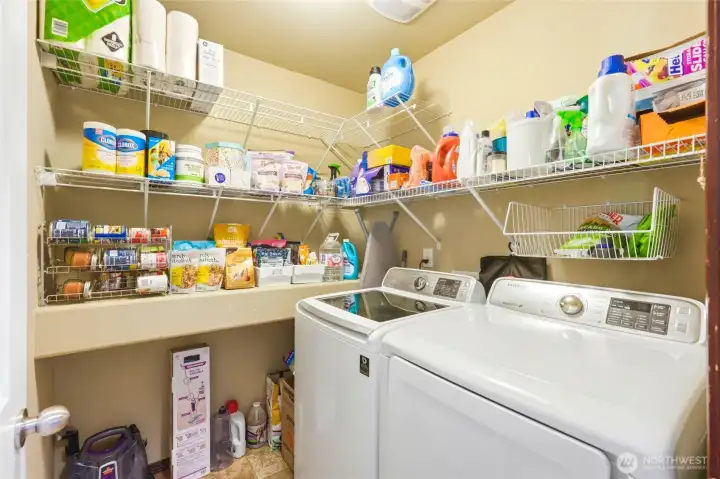 Utility room and pantry storage off kitchen. Washer and dryer convey.