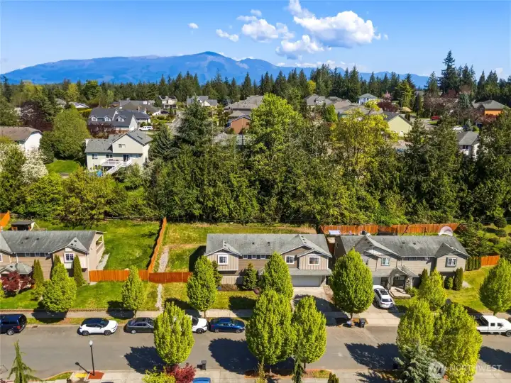 Tucked against a lush greenbelt, 310 Jeff Street offers rare privacy with the convenience of neighborhood living.