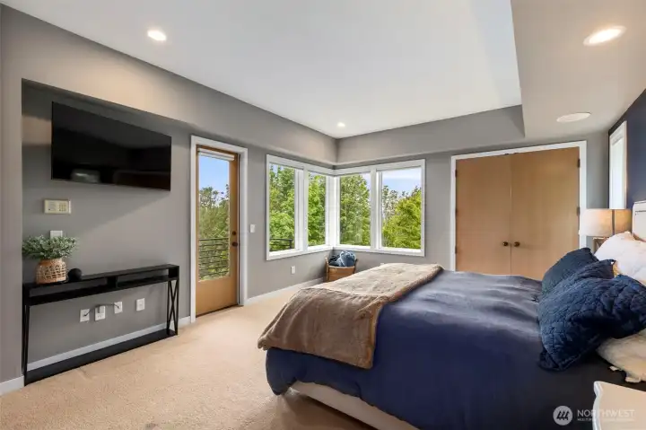 Primary Suite with private balcony and sweeping views