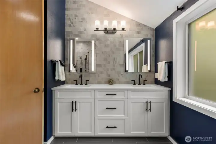 Ensuite with soaking tub, double shower and heated floors.