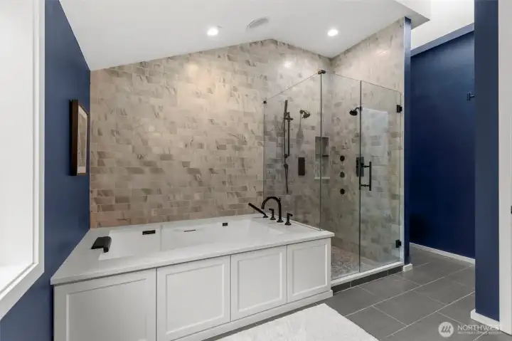 Ensuite with soaking tub, double shower and heated floors.