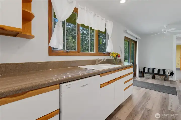 Kitchen: Anderson Windows, 3 windows and slider door. Brand new dishwasher