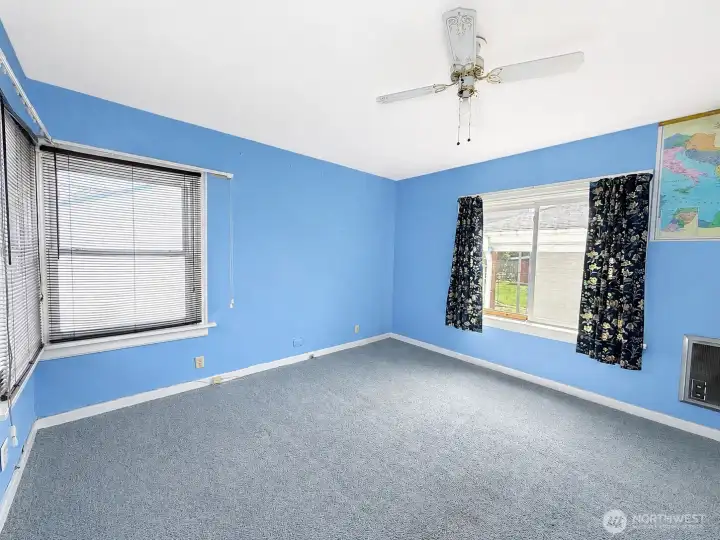 Third bedroom view from closet, vinyl windows make room light and bright