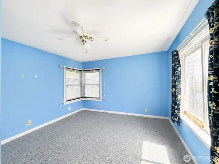 Third bedroom view from doorway, ceiling fan