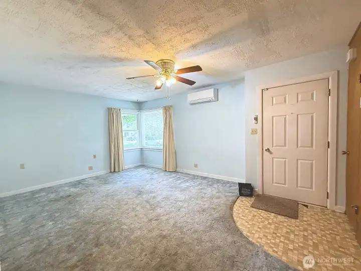Living room flows from dining room, vinyl windows throughout home, mini-split 3 heads