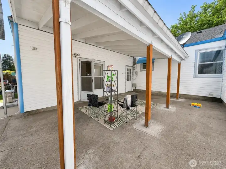 Covered patio, with access to bonus room and laundry room