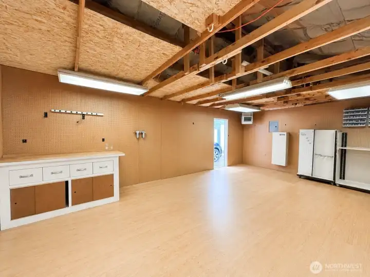 Interior of shop, complete with two heaters and storage