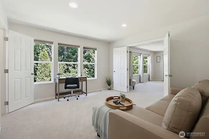 Bedroom number 5 opens to primary with  closet and hall door