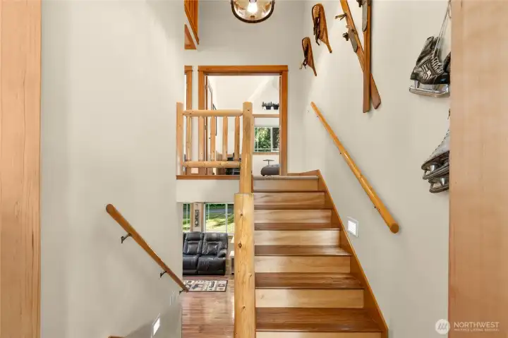 It's all about the details- log railing, hardwood floors, & Avalanche Ranch lighting.