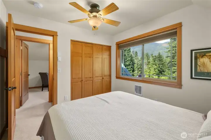 Guests will love this beautiful bedroom escape with mountain views! Laundry Closet is also in this room.