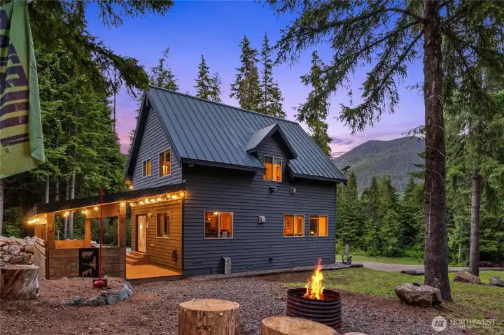Perfect fire pit area with well built wood-storage shed too!