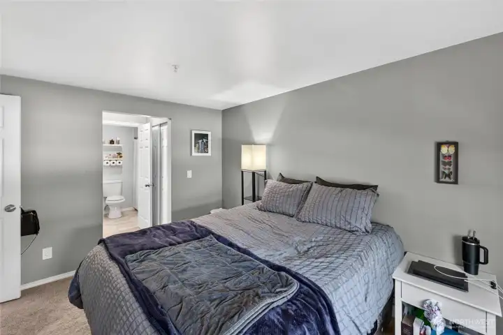 another view of the primary bedroom