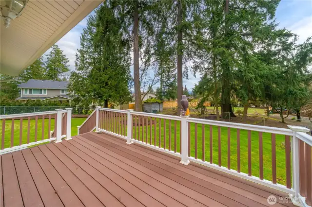 Access to the composite deck is from the main floor kitchen area.