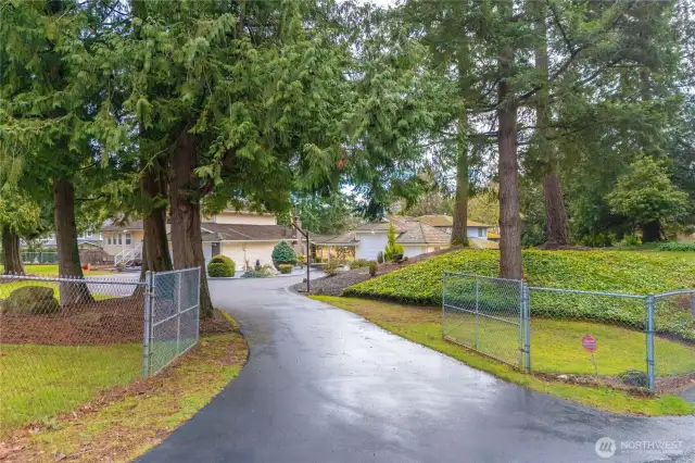 Your gated driveway is off a private road thats ONLY shared with 2 other neighbors!