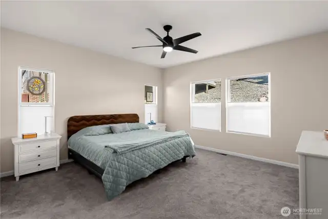 The primary bedroom is HUGE!  This king bed looks tiny in this big room!