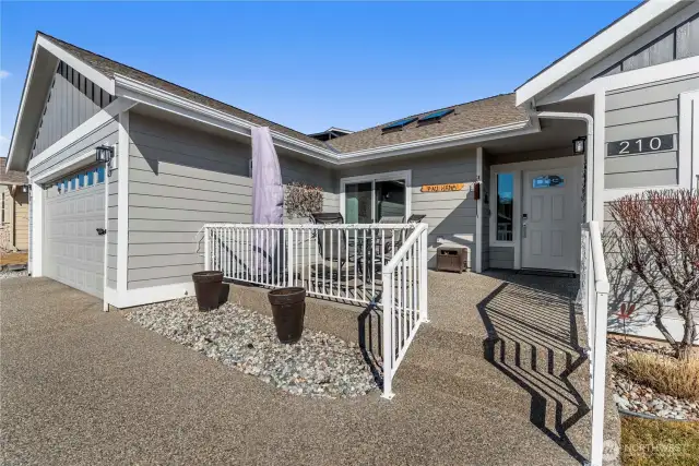 This big patio creates an inviting entry