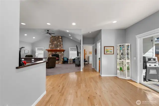 Here's the view as you enter the home. Side patio on the left, guest bath ahead on the right and down the hallway is guest bedroom #2.