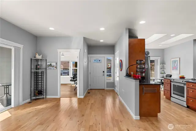 This home has huge spaces, and those solid wood floors are beautiful