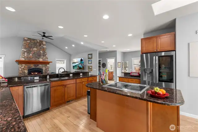 This kitchen is a chef's dream. Plenty of space to cook or bake without being cut off from your family or guests!