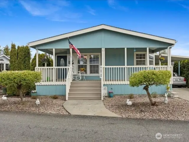 Perfectly Maintained & Beautiful HOME!  Welcoming front covered porch.