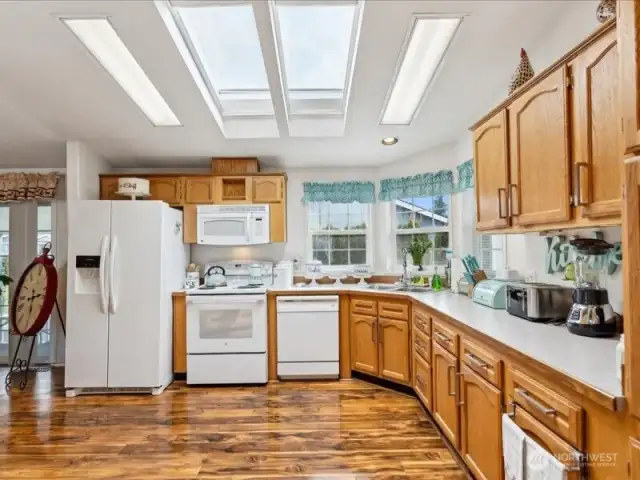 Chefs kitchen!  Lots of storage and preparation room plus skylights and engineered hardwood flooring.