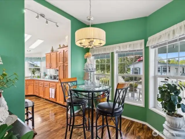 Dining area with big windows.