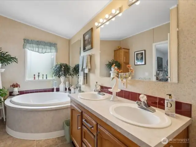 Vaulted ceilings in primary bathroom.