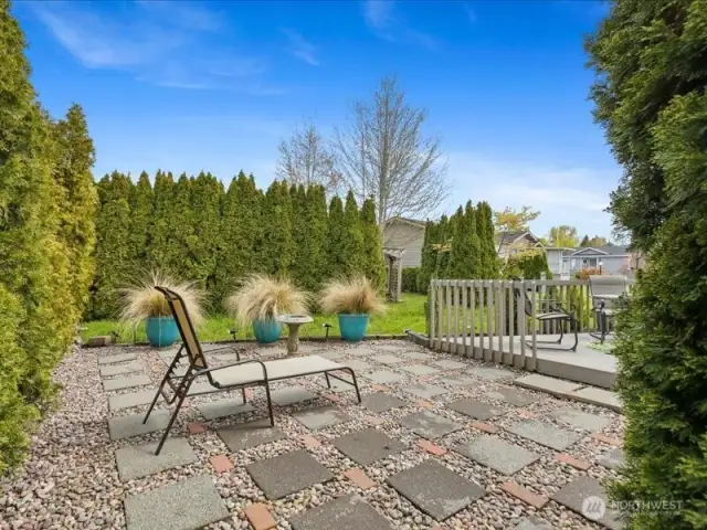 Back porch and relaxing area.  Great sun for gardening enthusiasts.