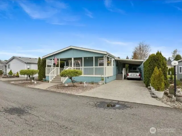 Welcome Home:)  Great curb appeal & beautiful front covered porch.  Covered carport parking for 2.  note: all roads have been repaved.