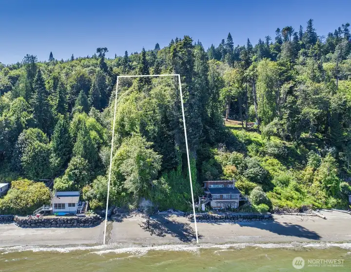 One of the last remaining waterfront lots on Kingston, with approximately 114 feet of sandy beach!